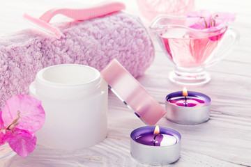 Spa set on white wooden background