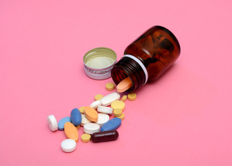 Tablet Pills coming out of Bottle - Medicine concept