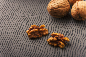 Open nuts on striped background