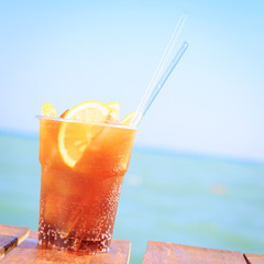 Concept of luxury tropical vacation. One Cuba Libre cocktail on
