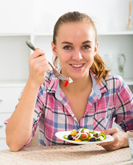 Girl eating salad