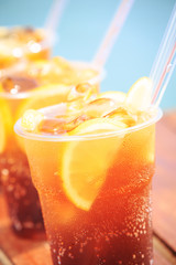 Concept of luxury tropical vacation. Three Cuba Libre cocktails