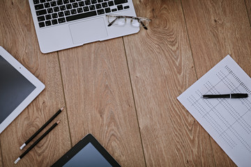 Fototapeta premium Office workplace with a laptop and documents