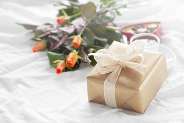 Beautiful colourful pretty gift or present in a natural paper wi