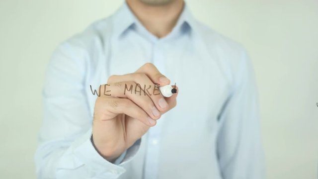 we Make it Easy, Man Writing on Transparent Screen