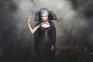 Woman witch smoke.