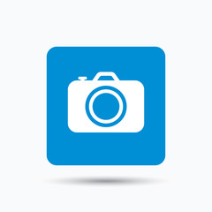 Camera icon. Professional photocamera symbol. Blue square button with flat web icon. Vector