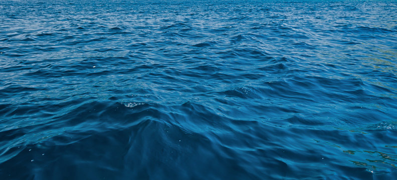 Fototapeta Blue and Dark water surface at deep ocean