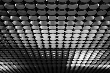 black and white ceiling with circle pattern