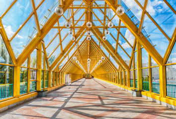 Fototapeta premium Walking inside Pushkinsky Pedestrian Covered Bridge in central M