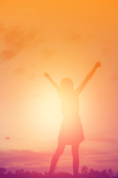 Young woman raise hands up for her success, Concept of Success i