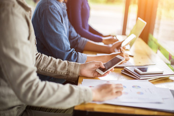 Business team working on laptop, while sitting at office. Busine