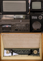 Old vintage audio system with radio, cassette tape recorder, record player