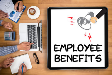 EMPLOYEE BENEFITS Man working on tablet TECHNOLOGY COMMUNICATION