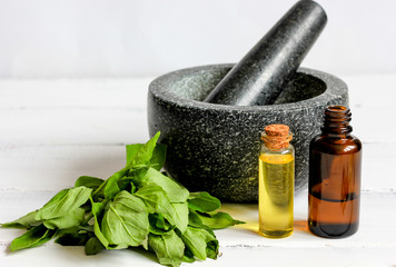 cooking spices in mortar home at wooden background