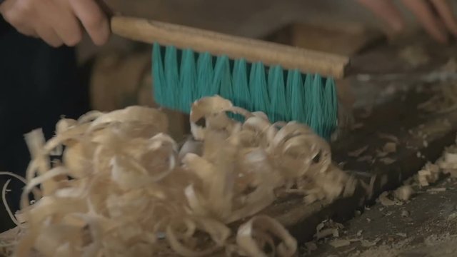 master carpenter makes basting on the Board with a pencil, draws, craftsman work tool in the workshop.
