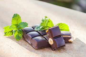 Chocolate with nuts and fresh mint