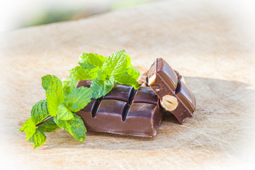 Chocolate with nuts and fresh mint