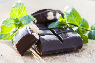 Chocolate with nuts and fresh mint