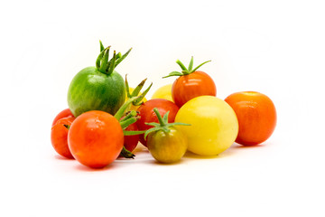 Group of homegrown cherry tomatoes  isolated on white