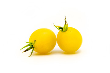 Two homegrown cherry tomatoes  isolated on white
