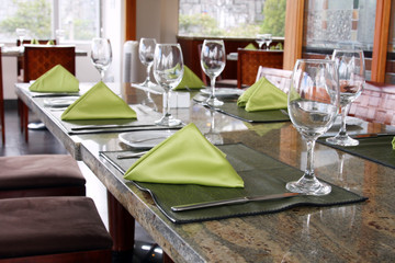 Fototapeta na wymiar interior of restaurant: professional table setting in luxury european cafe