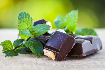 Chocolate with nuts and fresh mint
