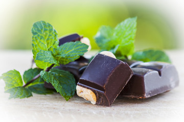 Chocolate with nuts and fresh mint
