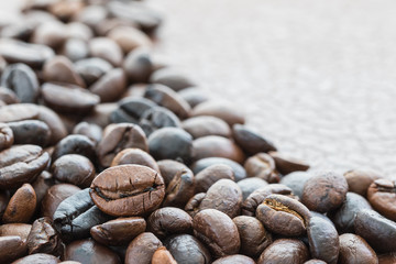Heap of roasted brown coffee beans