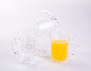 Orange juice in glasses on white background.