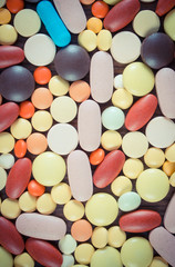 Fototapeta na wymiar Vintage photo, Colorful medical pills and capsules, health care concept