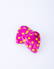 Chocolate or Colorful heart shape chocolate on a background.