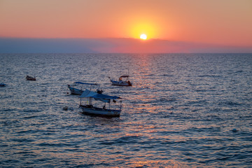 Naklejka premium Boats at sunset - Puerto Vallarta, Jalisco, Mexico