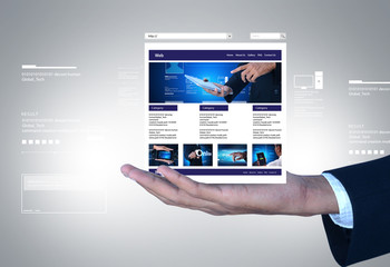 business man showing web page