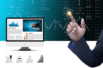 Man touching stock market graph