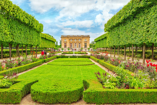 VERSAILLES, FRANCE - JULY 02, 2016 : Petit Trianon-beautiful Gar