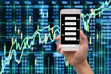 Female hand holding mobile phone showing the chat message before