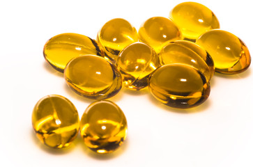 Fish oil capsules on white