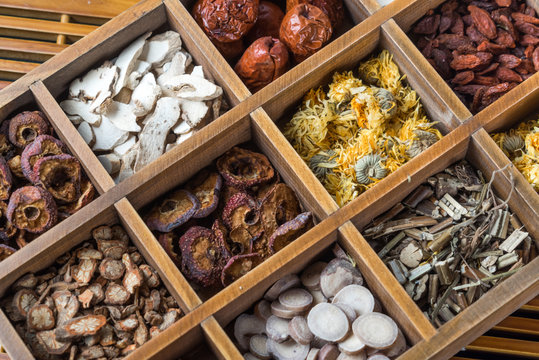 Chinese Herbal Medicine In Box On Table.