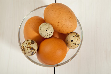 ?ggs on a wooden white table