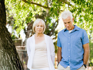 Senior couple relaxing in park