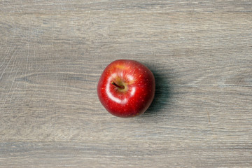 Apple on wooden table