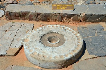 Ancient offering table at the Minoan Malia ruins archaeological site, Malia, Crete.