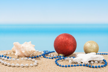 Christmas tree decorations on the beach in tropical. Concept of