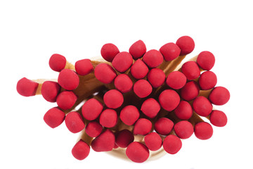 Heap of matches with rad heads isolated on white background