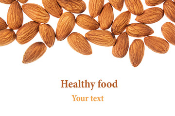 Nuts border of almonds on white background. Pile of selected almond close-up. Isolated.  For...