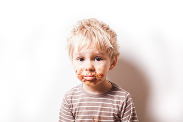 Boy eated chocolate