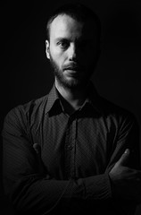 handsome bearded man in the dark