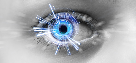 Eye of a woman with digital interface in front of it