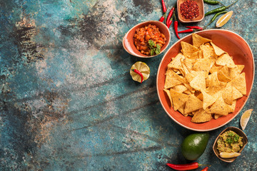 Nachos in plate with guacamole